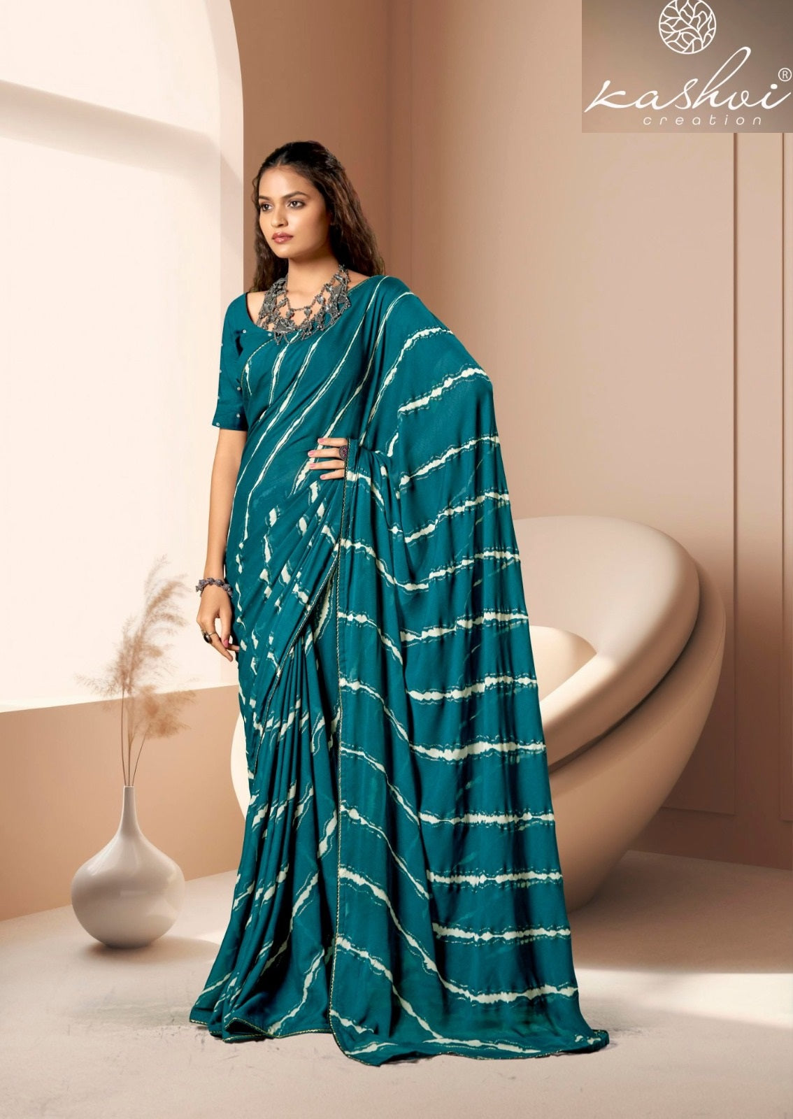 Amrita Kashvi Creation Dull Moss Sarees Wholesaler Gujarat