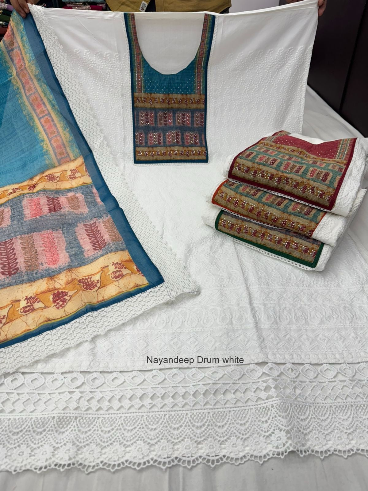 Drum White Nayandeep Cotton Dress Material Wholesaler India