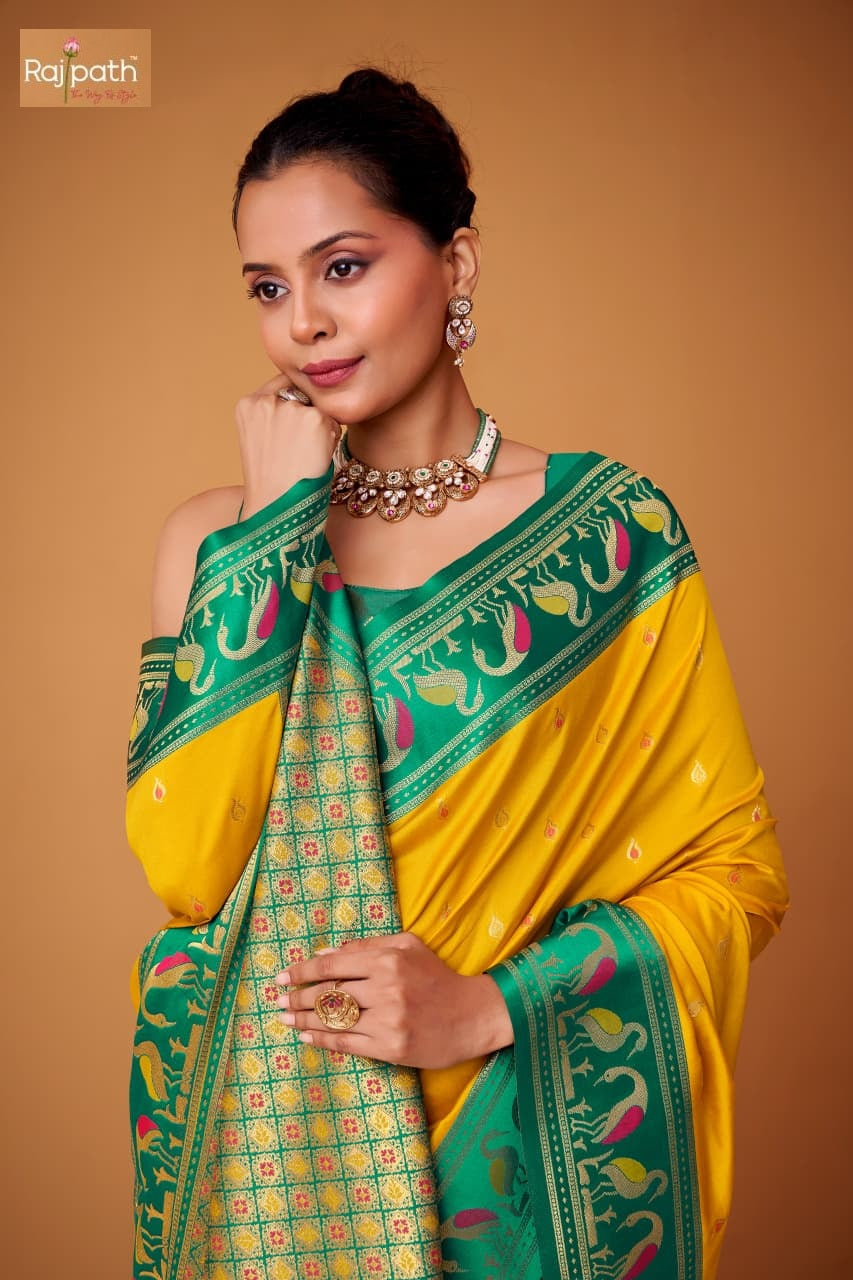 Flamingo Sattin Rajpath Sarees Exporter