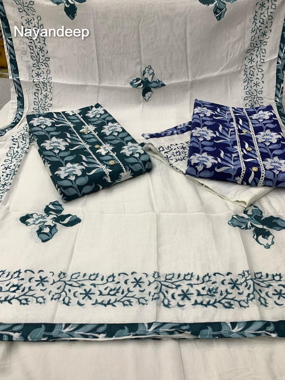 Kumkum 250425 Nayandeep Cotton Dress Material Supplier Gujarat