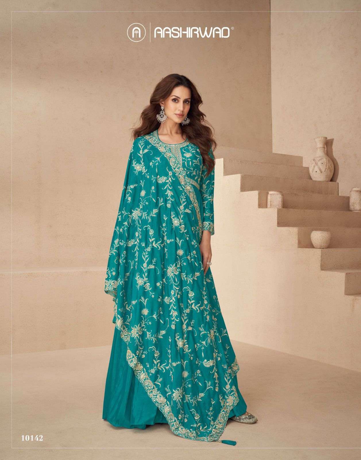 New Kesariya Aashirwad Creation Chinnon Gown Dupatta Set Wholesaler Gujarat