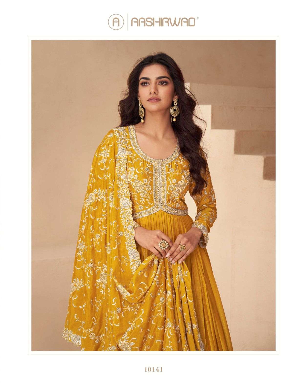 New Kesariya Aashirwad Creation Chinnon Gown Dupatta Set Wholesaler Gujarat