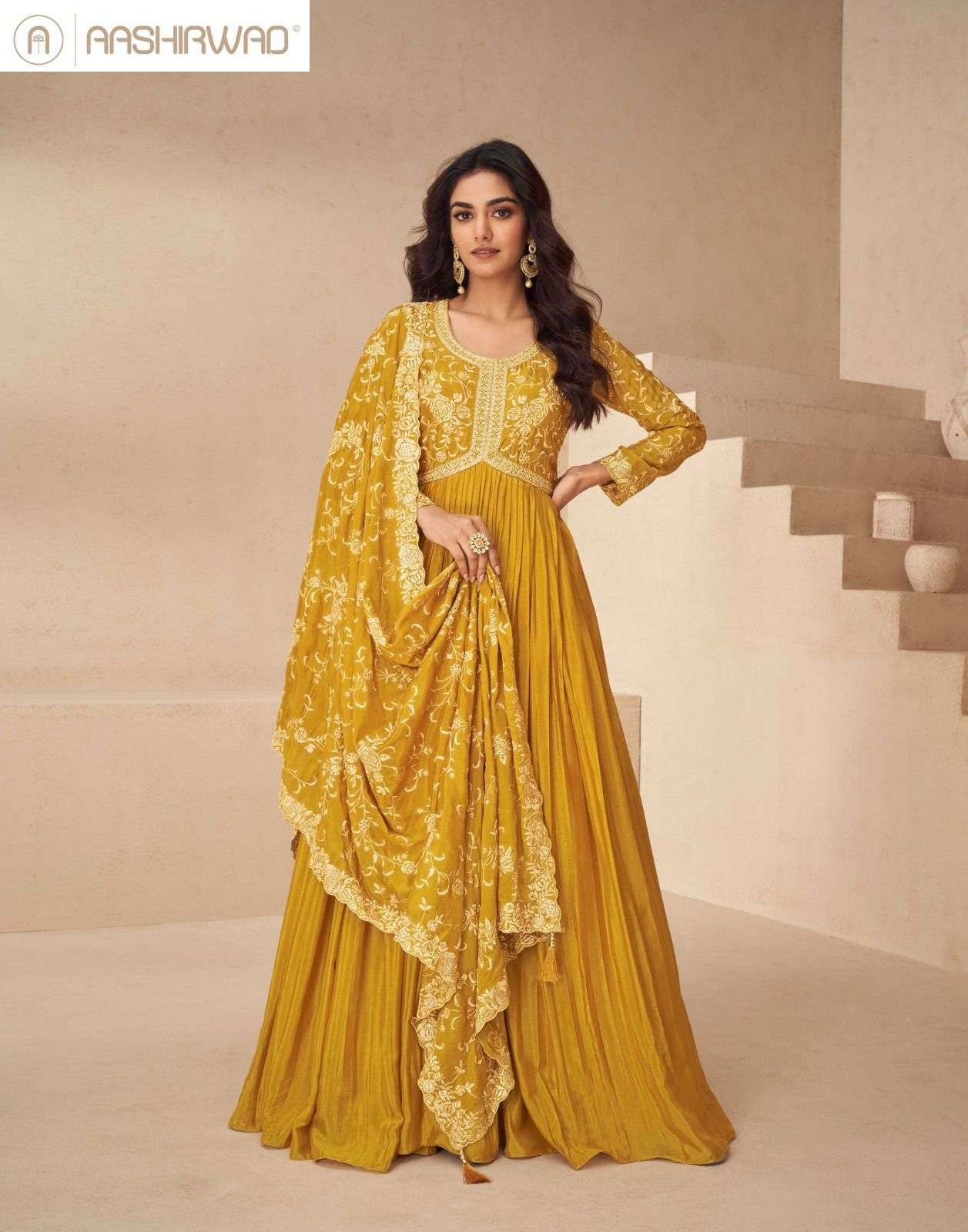 New Kesariya Aashirwad Creation Chinnon Gown Dupatta Set Wholesaler Gujarat